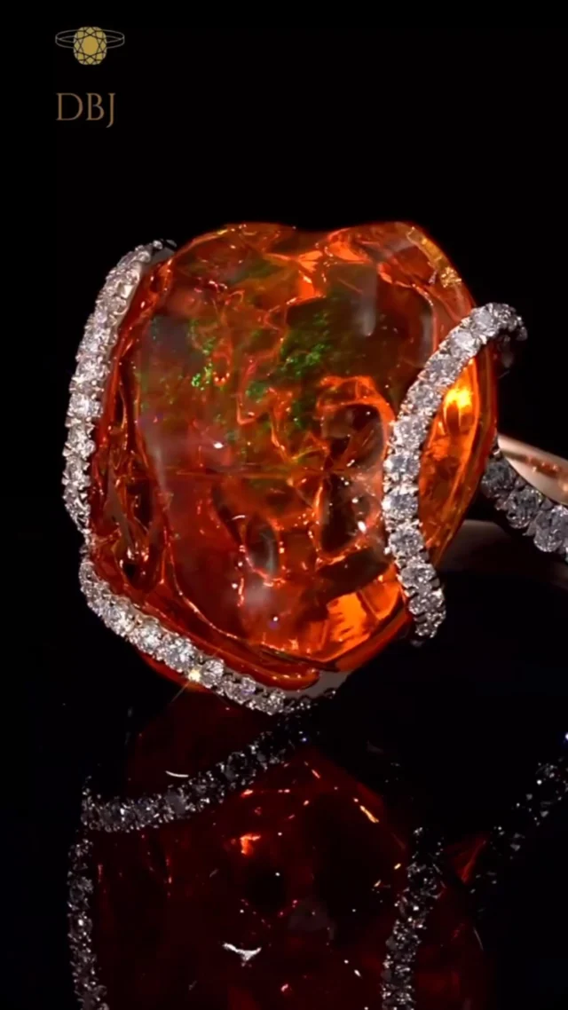 Warm tones, radiant sparkle. 🧡💎
This amber stone cocktail ring, studded with diamonds, is your go-to for earthy elegance and bold brilliance.

#AmberRing #CocktailJewelry #DiamondGlow #StatementRing #DBJJewelry #WarmElegance #LuxuryRings #EarthyGlamour #FineJewels #CraftedToShine