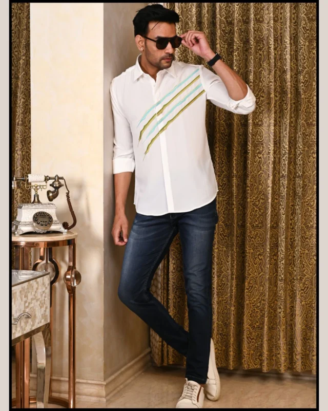 Make a subtle statement.This white cotton shirt with embroidered waves is where comfort meets character. 🌊Lightweight, breathable, and made to move with you — from casual coffees to semi-formal evenings. Style it your way. Always.

#MensStyle #WhiteShirtEdit #ModernMenswear #EverydayClassics #EmbroideredStyle #MensFashionIndia #AutographMan #CottonShirt #WardrobeEssential #SmartCasualLook #IndianMenswear #StyleWithEase #MinimalMenswear #WavesOfStyle #clothingbrand #apparel #onlineshopping #clothes #streetwear #shirtdesign #customshirts #shirtstyle #shirtsformen #design #trendingpost #shopping