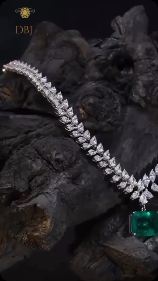 A masterpiece of green grandeur. 💚
This emerald statement necklace, adorned with fancy-shaped diamonds, is elegance and opulence in perfect harmony.
#EmeraldNecklace #StatementJewelry #FancyCutDiamonds #DBJJewelry #LuxuryJewelry #GemstoneElegance #OpulentDesigns #FineJewelry #JewelryGoals #CraftedToShine