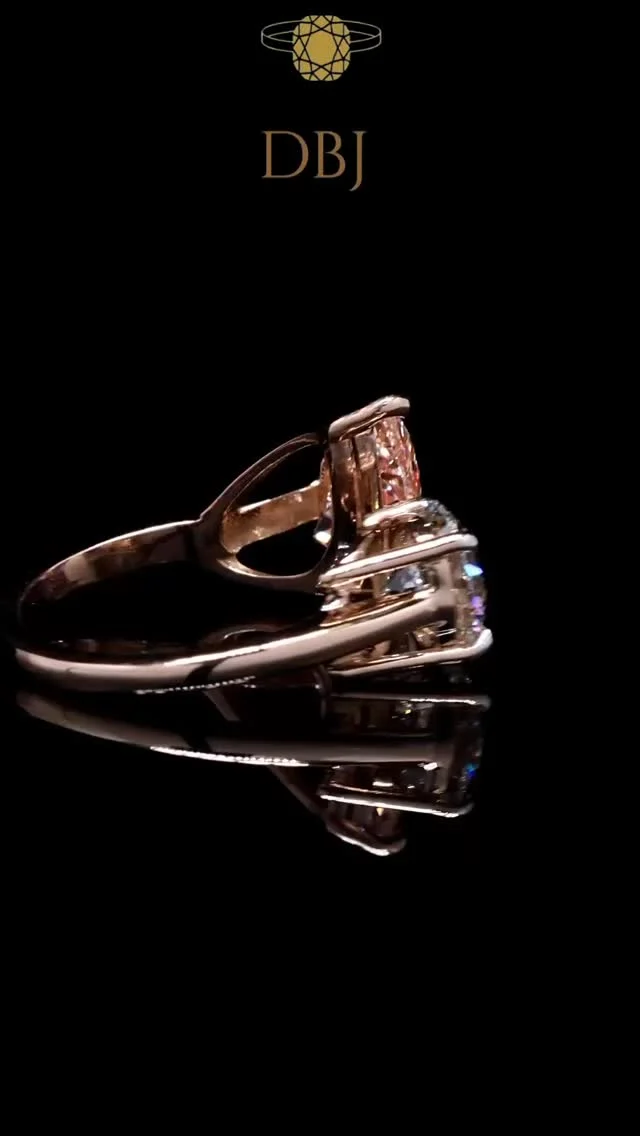 Two stones, one story. 💞✨
This Toi et Moi ring, featuring a pink diamond solitaire and a round diamond solitaire, celebrates love, balance, and brilliance. 💍#ToiEtMoiRing #PinkDiamond #DBJJewelry #LuxuryRings #DiamondElegance #FineJewelry #ModernRomance #StatementRing #TimelessSparkle #CraftedToShine
