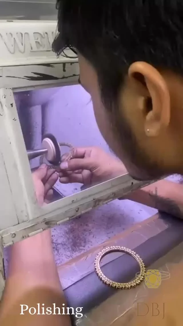 The Polishing stage is the final stage where the polishing of the jewellery takes place. The polishing is done to ensure the better shine of the jewellery, which is carried out after setting of stones. The polishing can be carried out by both means; either manual or by machine. The tools which help the craftsmen to polish the jewellery manually includes soft buff, solid buff, hair buff, single line ball buff, coin buff, platinum polishing rouse, red and green rouse (to impart shine), black lustre to remove casting or filling layers, and white lustre for the removal of roughness.